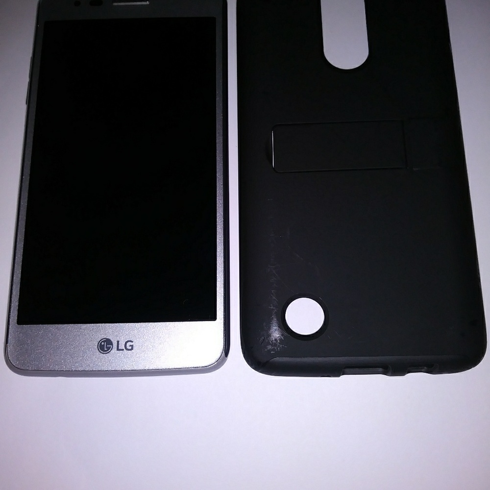 LG Aristo smartphone w/case